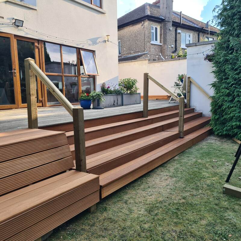Finished deck steps with handrails
