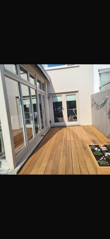 Same balcony finished with fresh golden decking
