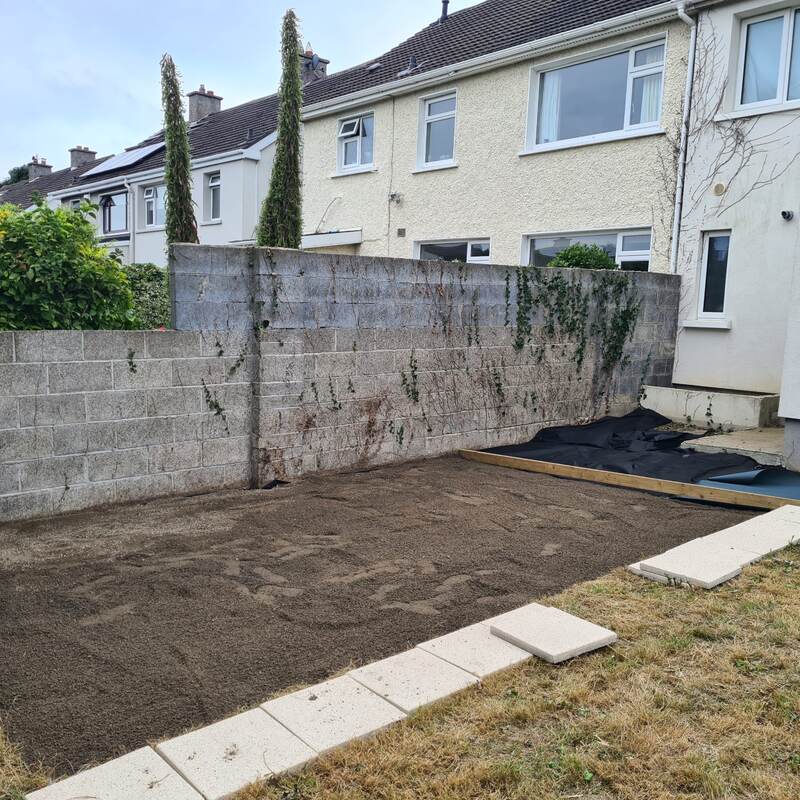Weed membrane and edging slabs laid, ready for the patio