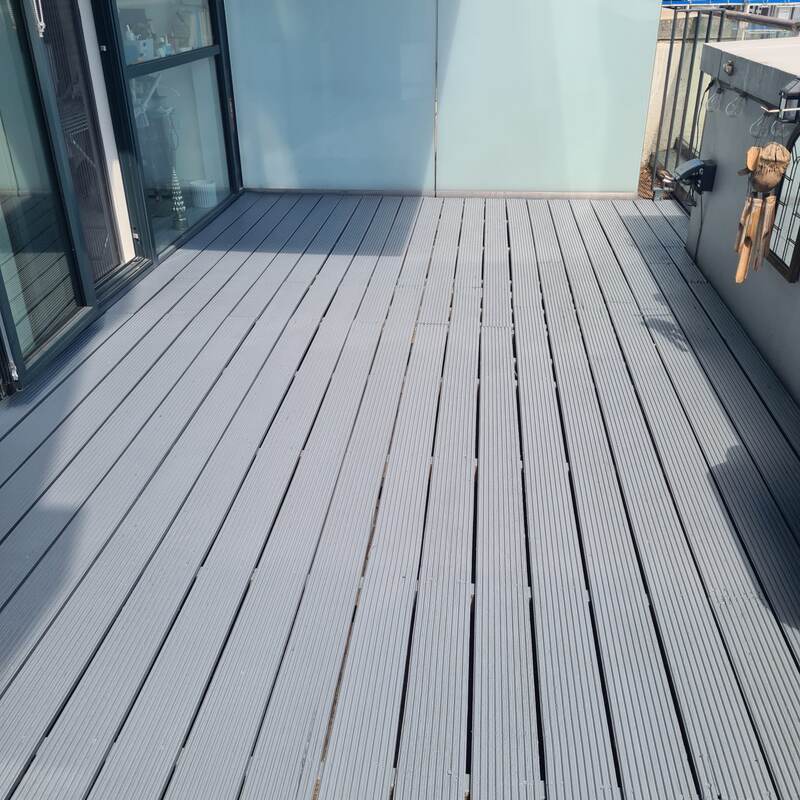 Same balcony decking repainted grey